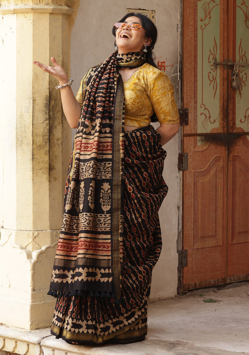 Saksha Syahi Black Ajrakh Print Saree with Yellow Blouse.