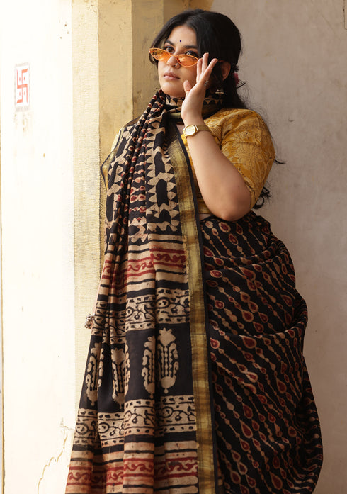 Saksha Syahi Black Ajrakh Print Saree with Yellow Blouse.