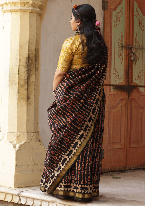 Saksha Syahi Black Ajrakh Print Saree with Yellow Blouse.