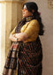 Saksha Syahi Black Ajrakh Print Saree with Yellow Blouse.